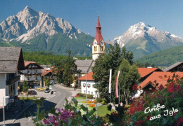 1 AK Österreich / Tirol * Igls Mit Der Pfarrkirche St. Ägidi - Im Hintergrund Serles (2.719 M) Und Habicht (3.280 M) * - Igls