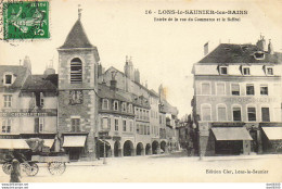 39 LONS LE SAUNIER LES BAINS ENTREE DE LA RUE DU COMMERCE ET LE BEFFROI - Lons Le Saunier