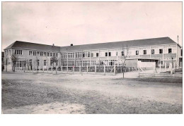 72 . N° 44603 . Ecommoy . Groupe Scolaire . Vue Generale . Cpsm 14 X 9 Cm. - Ecommoy