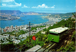 2-7-2024 (4) Hong Kong - Peak Cable Car (Funiculaire) With Aircraft Carrier In Hong Kong Bay Below - Kabelbanen