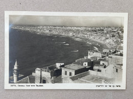 REAL PHOTO POSTCARD BY ELIAHU BROS - JAFFA, GENERAL VIEW WITH TEL AVIV. PALESTINE, ISRAEL - Palestina