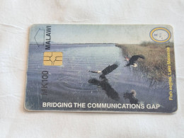 MALAWI-(MW-MPTC-0002-MLW-02)-Canoe On Lake Malawi (Old Logo)-(5)-(0100-058971)-(100Malawian Kwacha)-used Card - Malawi