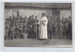 Tanganyika - Mission Children And An European Nun - PHOTOGRAPH Postcard Size - Publ. Unknown  - Tanzania