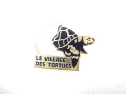 PIN'S  ANIMAUX     LE VILLAGE DES TORTUES  Email Grand Feu - Animaux