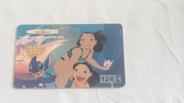 SPAIN-(CP-256)-Lilo & Stitch (Disney)-(140)(Y 06561127)-(6/2002--12/2004)-(Telfonica)-(12€)-(tirage-501.500)-used Card - Commemorative Advertisment