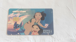 SPAIN-(CP-256B)-Lilo & Stitch (Disney)-(142)(Y 06741531)-(6/2002--12/2004)-(Telfonica)-(12€)-(tirage-501.500)-used Card - Herdenkingsreclame