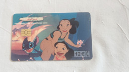 SPAIN-(CP-256B)-Lilo & Stitch (Disney)-(143)(Y 06784056)-(6/2002--12/2004)-(Telfonica)-(12€)-(tirage-501.500)-used Card - Herdenkingsreclame