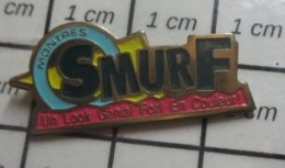 1719 Pin's Pins / Beau Et Rare / MARQUES / MONTRES SMURF UN LOOK GENIAL FORT EN COULEURS - Merken